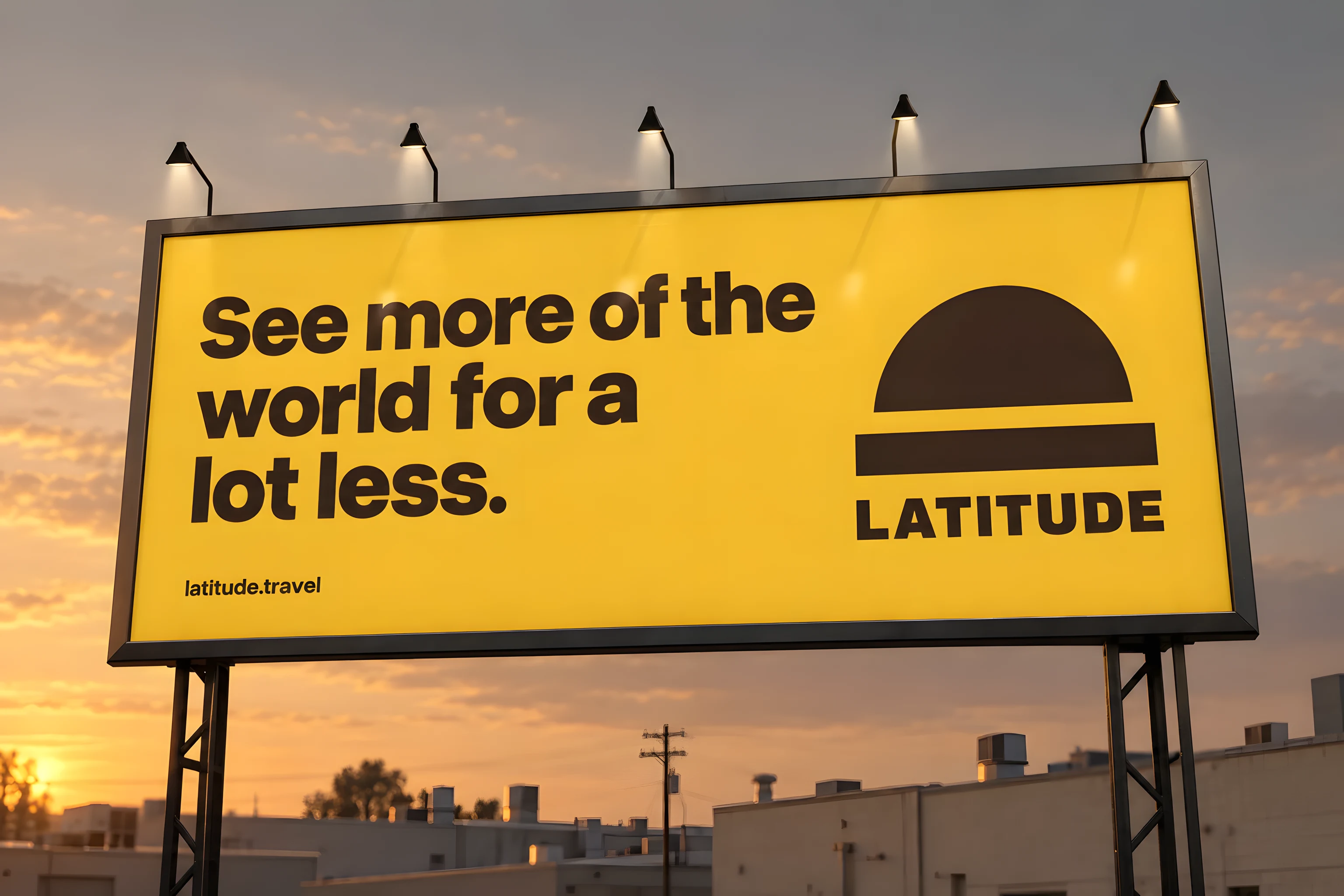 A lit roadside billboard at dusk: a golden yellow face reading See more of the world for a lot less in dark cocoa, with the half-dome mark and the LATITUDE wordmark on the right.